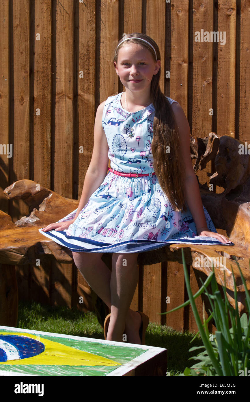 Southport, Merseyside, UK. 14th August, 2014. Sophie Turner, 10 years old winner of the Children's design competition, at Britain's biggest independent flower show.  Credit:  Mar Photographics/Alamy Live News. Stock Photo