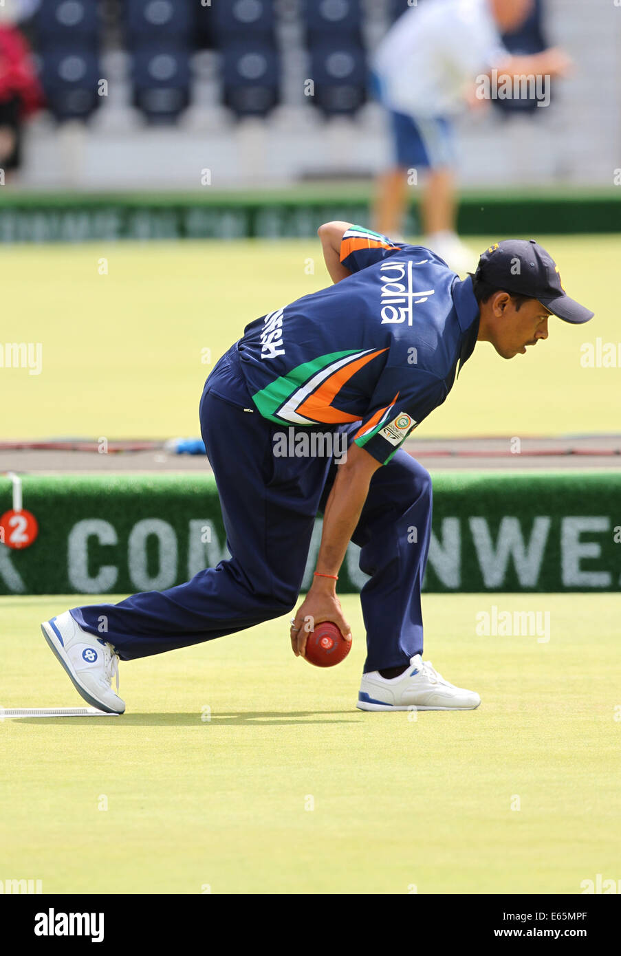 Dinesh KUMAR of India v Australia in the bronze medal match in the mens fours at the Kelvingrove Lawn Bowls Centre, Stock Photo