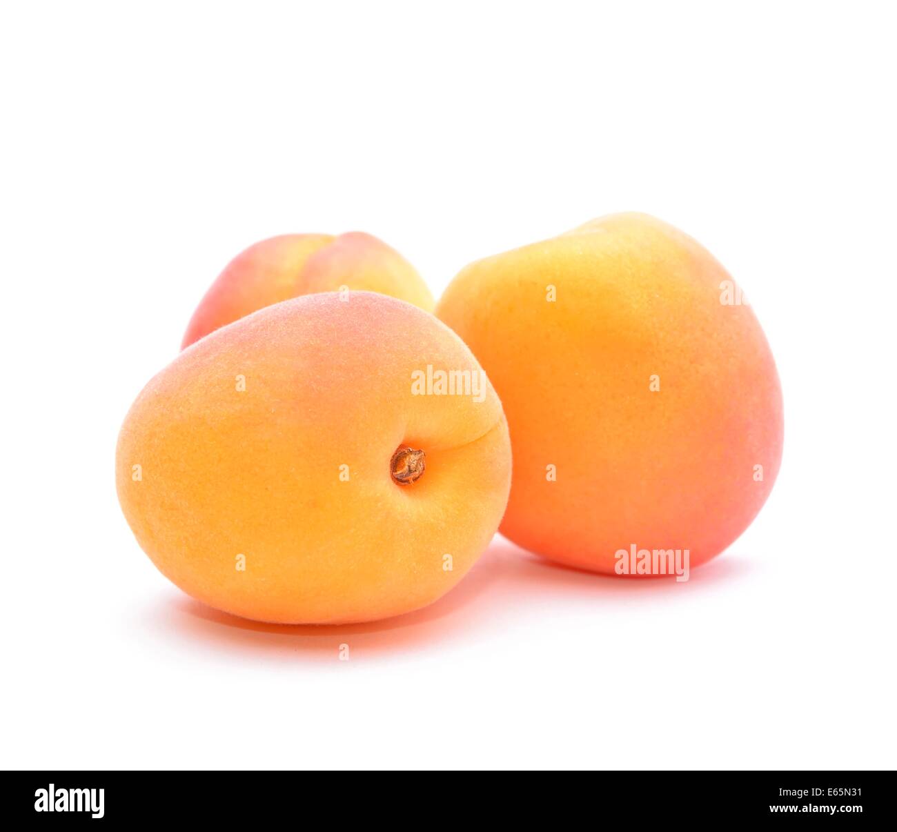 Apricots isolated on white background Stock Photo - Alamy