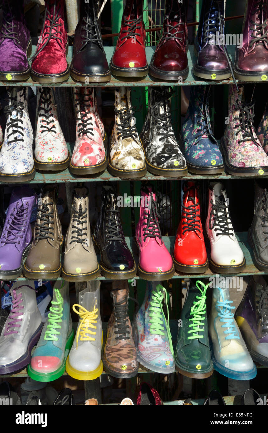 Coloured Dr Martens boots displayed on a market stall, London, UK Stock  Photo - Alamy