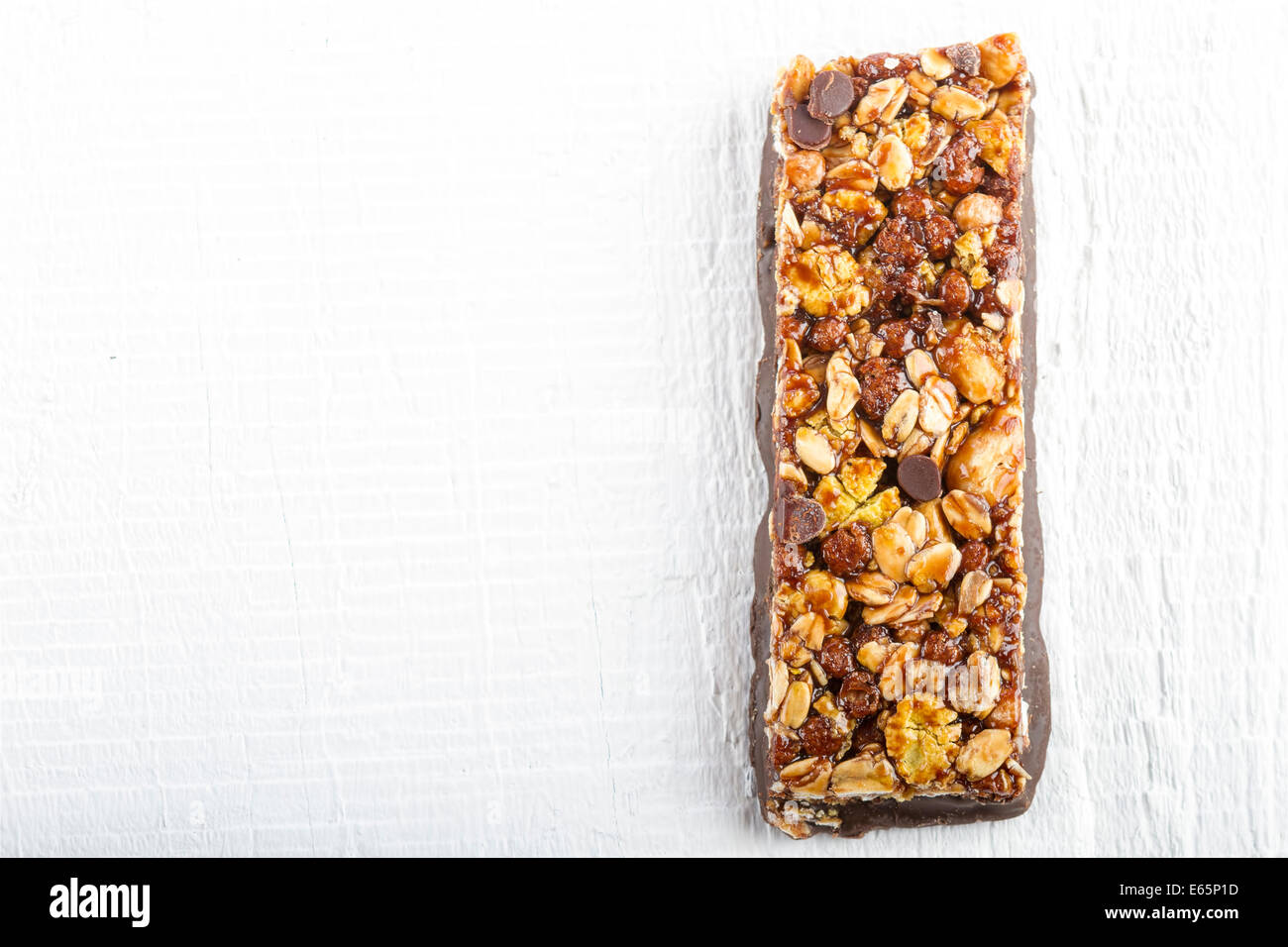 Chocolate Muesli Bars on white wooden background Stock Photo Alamy