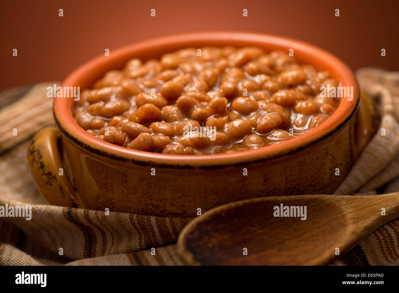 A bowl of delicious baked beans with molasses. Stock Photo