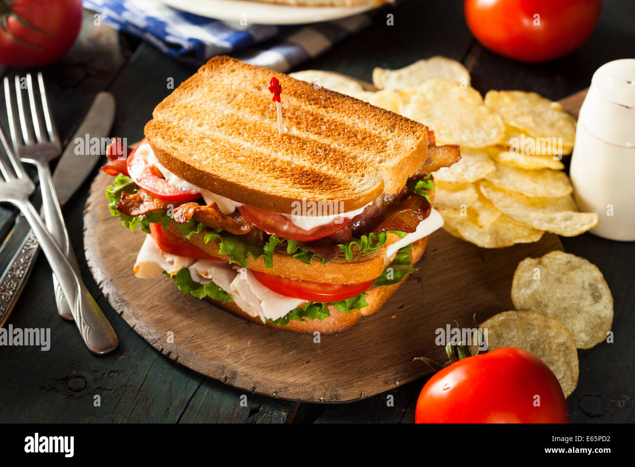 Turkey and Bacon Club Sandwich with Lettuce and Tomato Stock Photo - Alamy