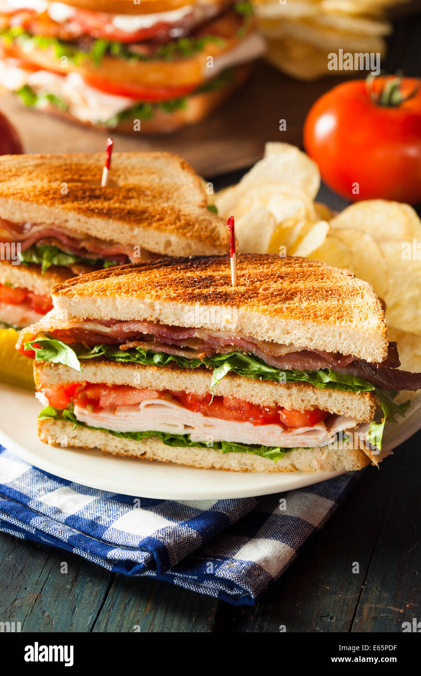 Turkey and Bacon Club Sandwich with Lettuce and Tomato Stock Photo