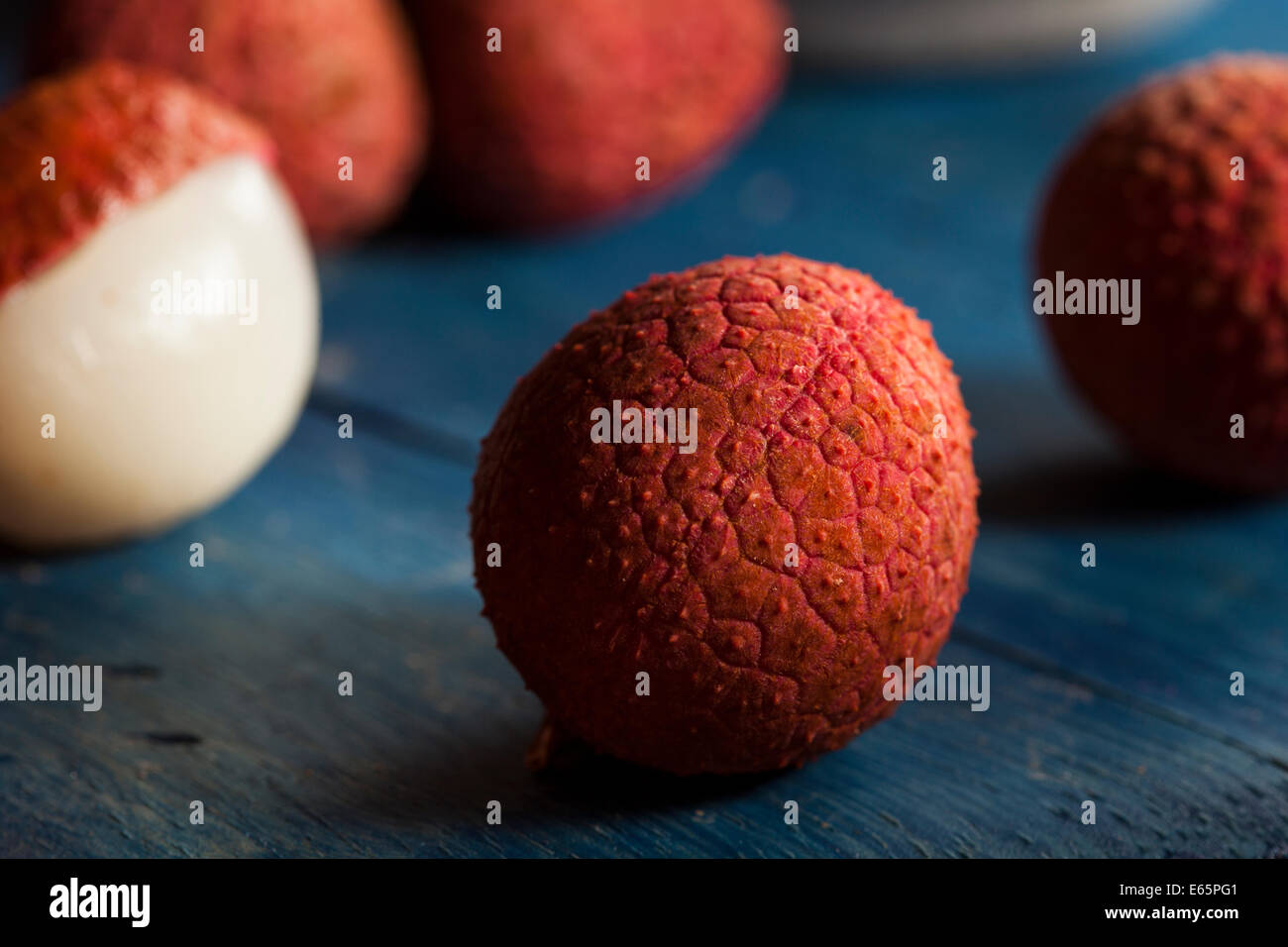 Healthy Organic Red Lychee on a Background Stock Photo
