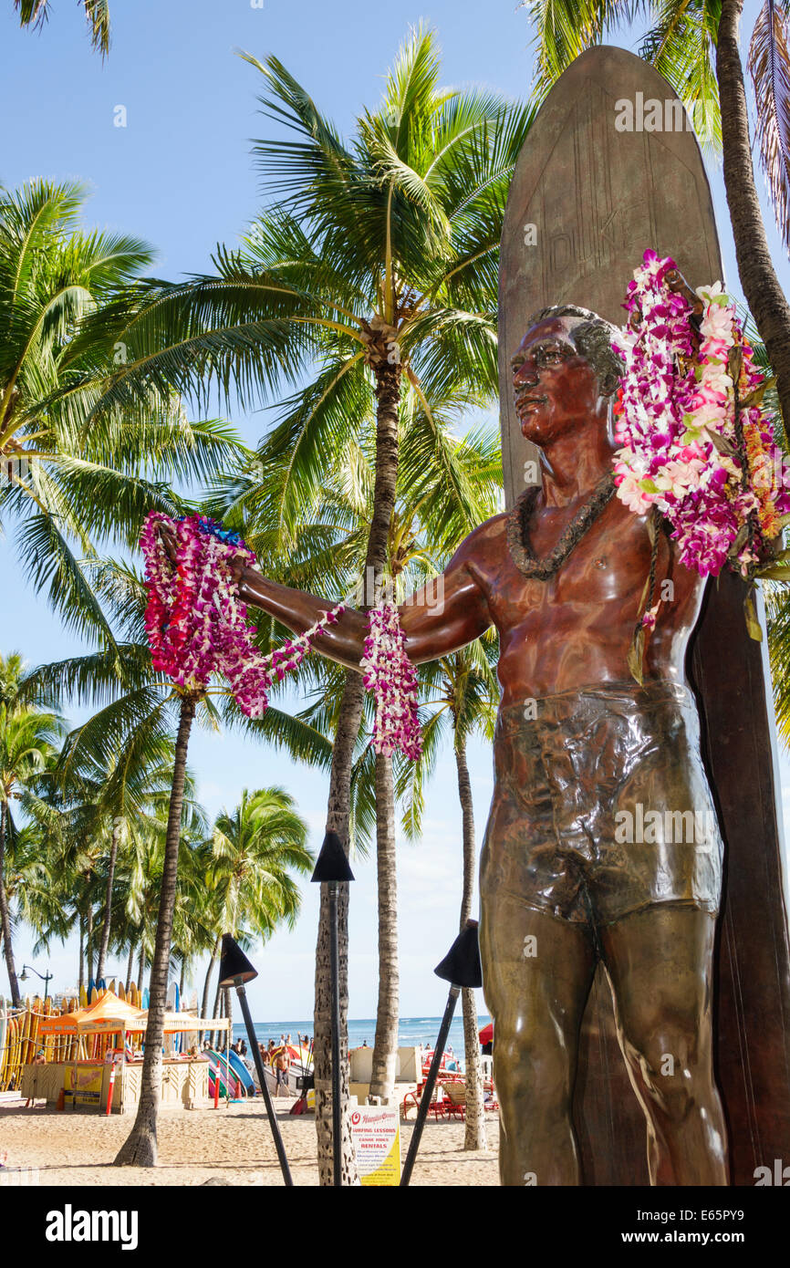 Honolulu Hawaii,Oahu,Hawaiian,Waikiki Beach,resort,Kuhio Beach State Park,Duke Kahanamoku,statue,surfer,Olympic swimmer,surfboard,leis,palm trees,USA, Stock Photo