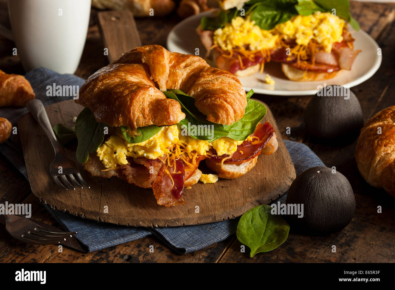Ham and Cheese Egg Breakfast Sandwich on a Croissant Stock Photo Alamy