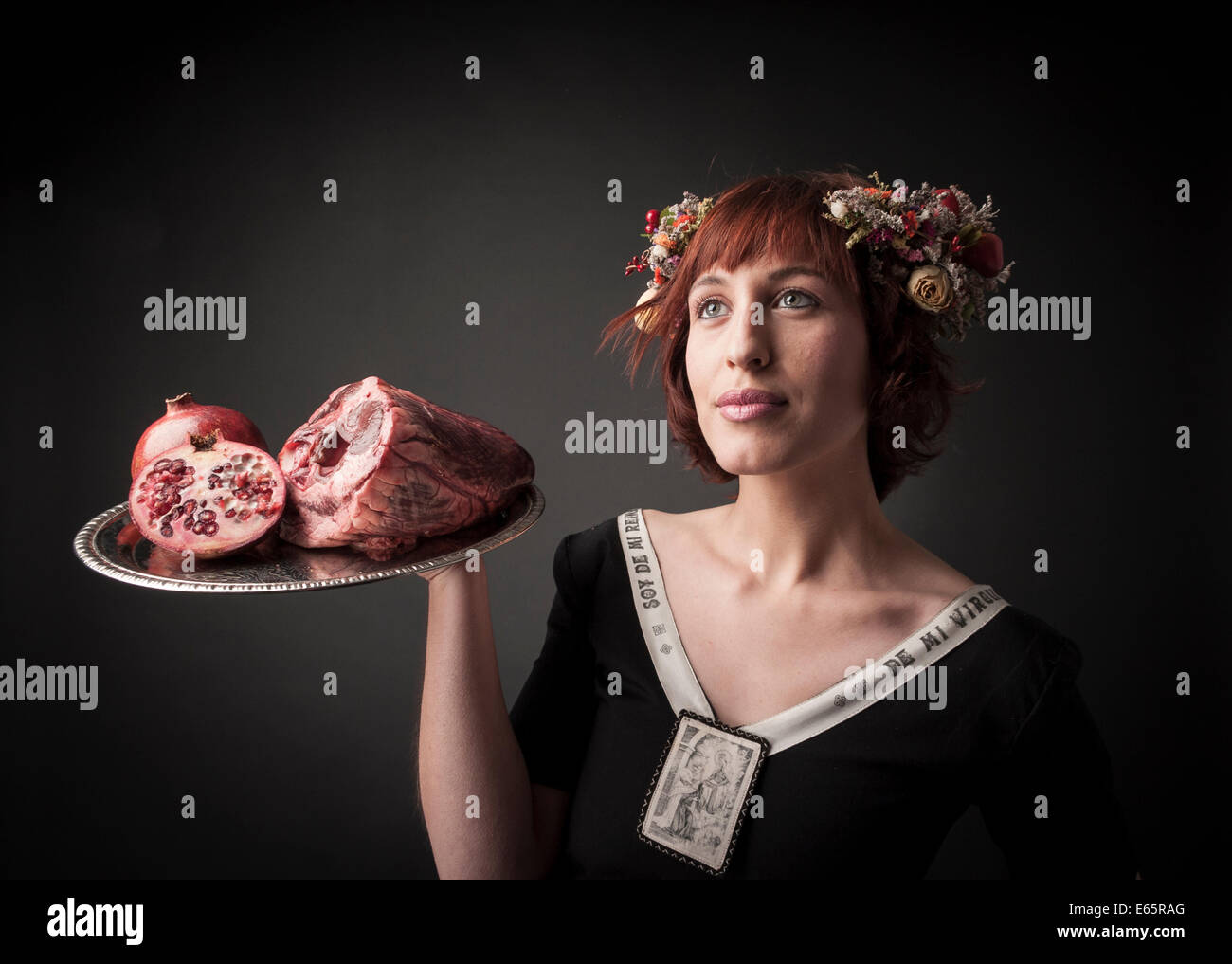 maid serving raw food Stock Photo