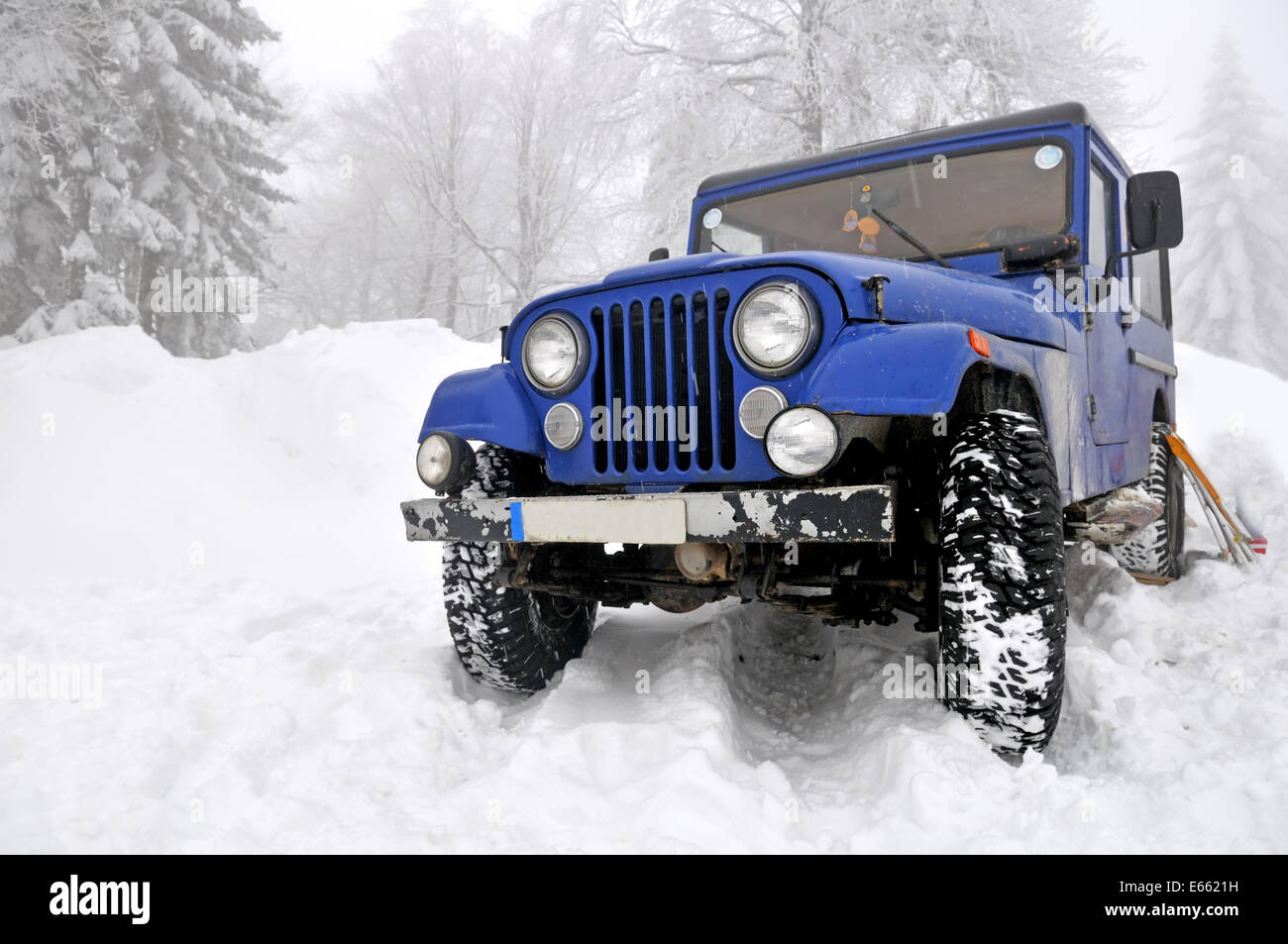 Offroad 4x4 in the snow Stock Photo