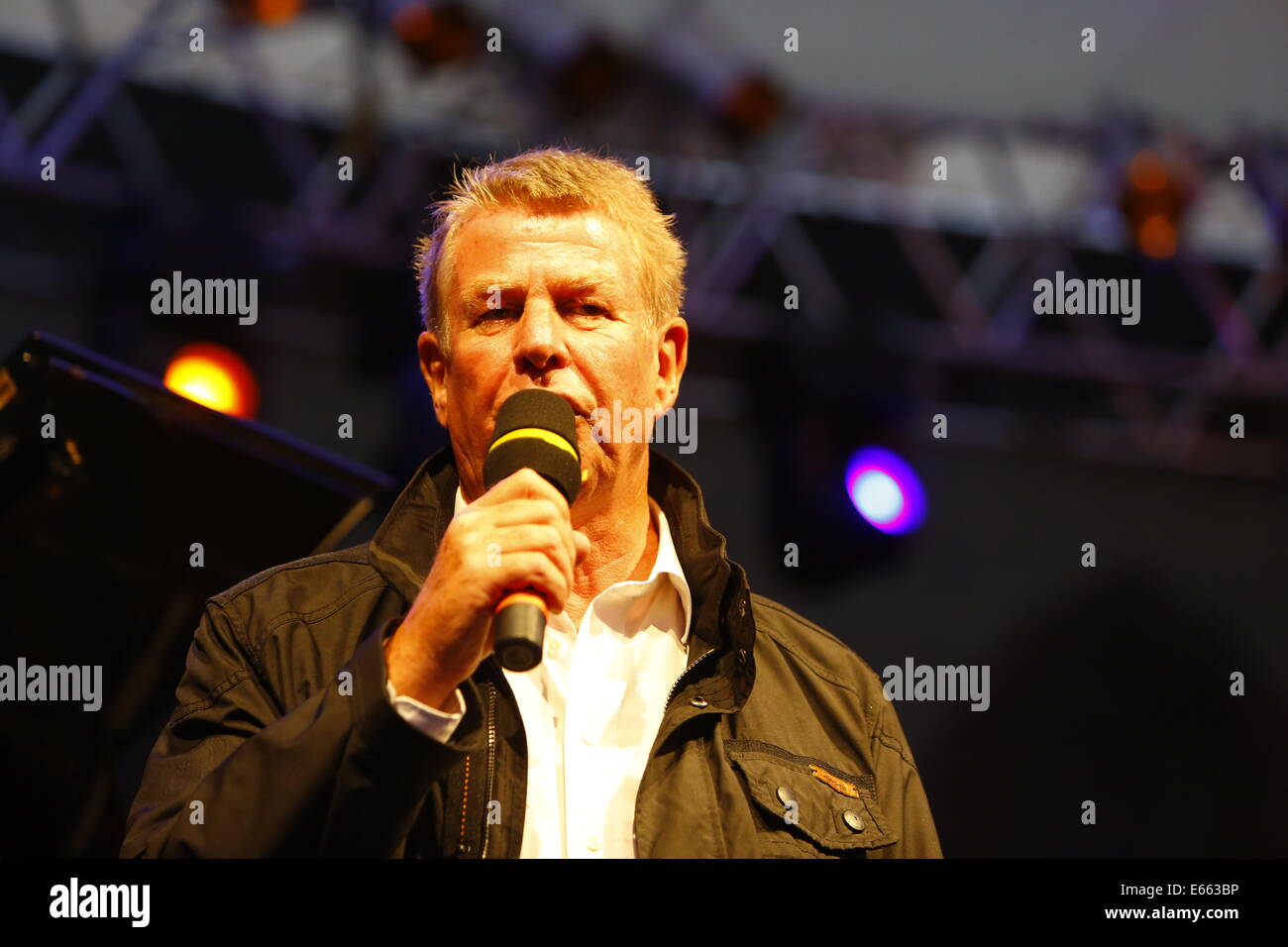 Worms, Germany. 15th August 2014. The Lord Mayor of Worms, Michael Kissel, addresses the audience. The 2014 Jazz and Joy Festival in Worms opened with a performance of regional Jazz musicians who have been selected especially for this performance by the artistic director of the festival. Credit:  Michael Debets/Alamy Live News Stock Photo