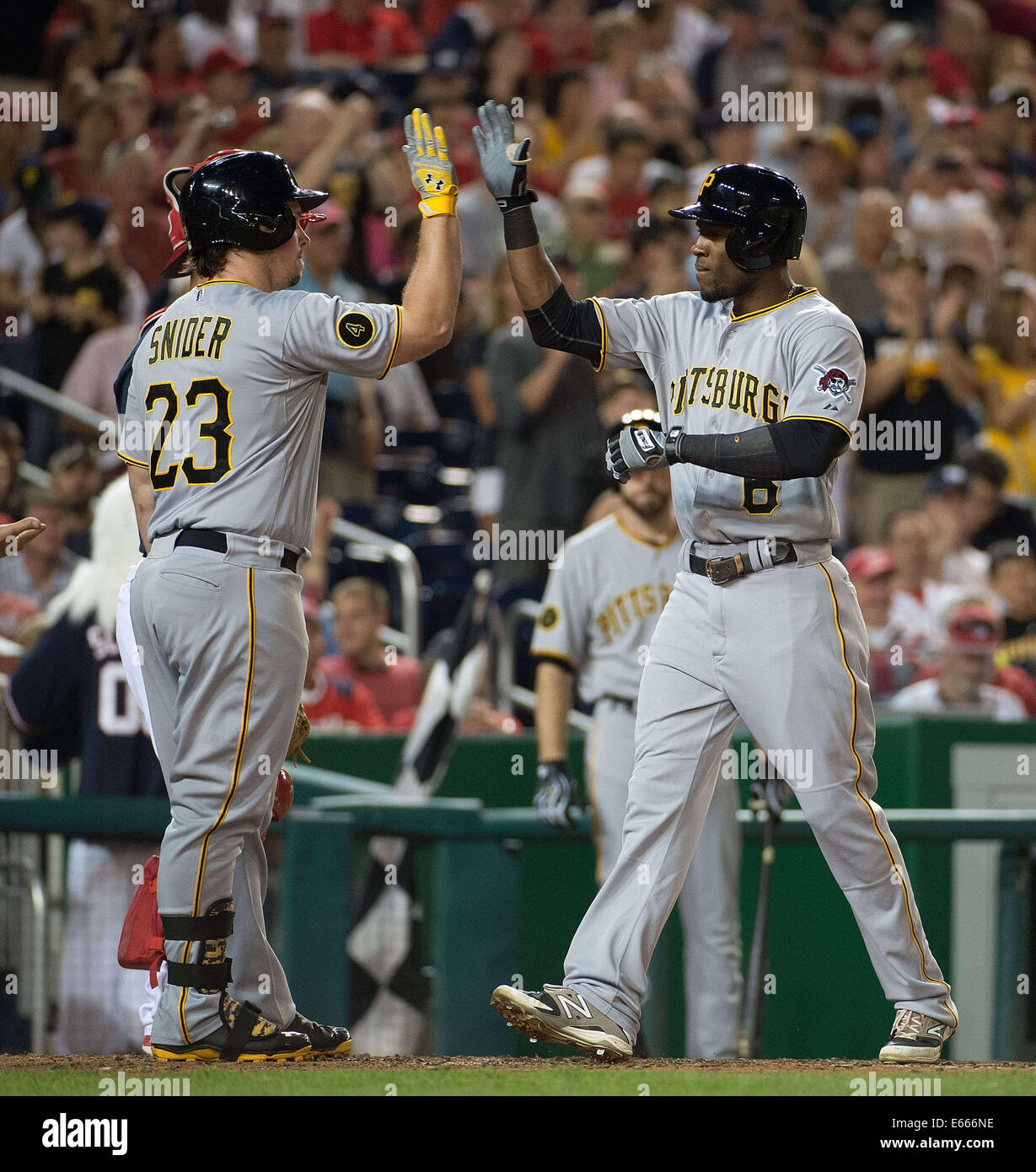 Washington, DC, USA. 15th Aug, 2014. Pittsburgh Pirates right fielder Travis Snider (23) congratulates left fielder Starling Marte (6), right, after Marte hit a two-run home run off Washington Nationals starting pitcher Tanner Roark (57) during the fourth inning of their game at Nationals Park in Washington, D.C, Friday, August 15, 2014. Credit:  Harry E. Walker/ZUMA Wire/Alamy Live News Stock Photo