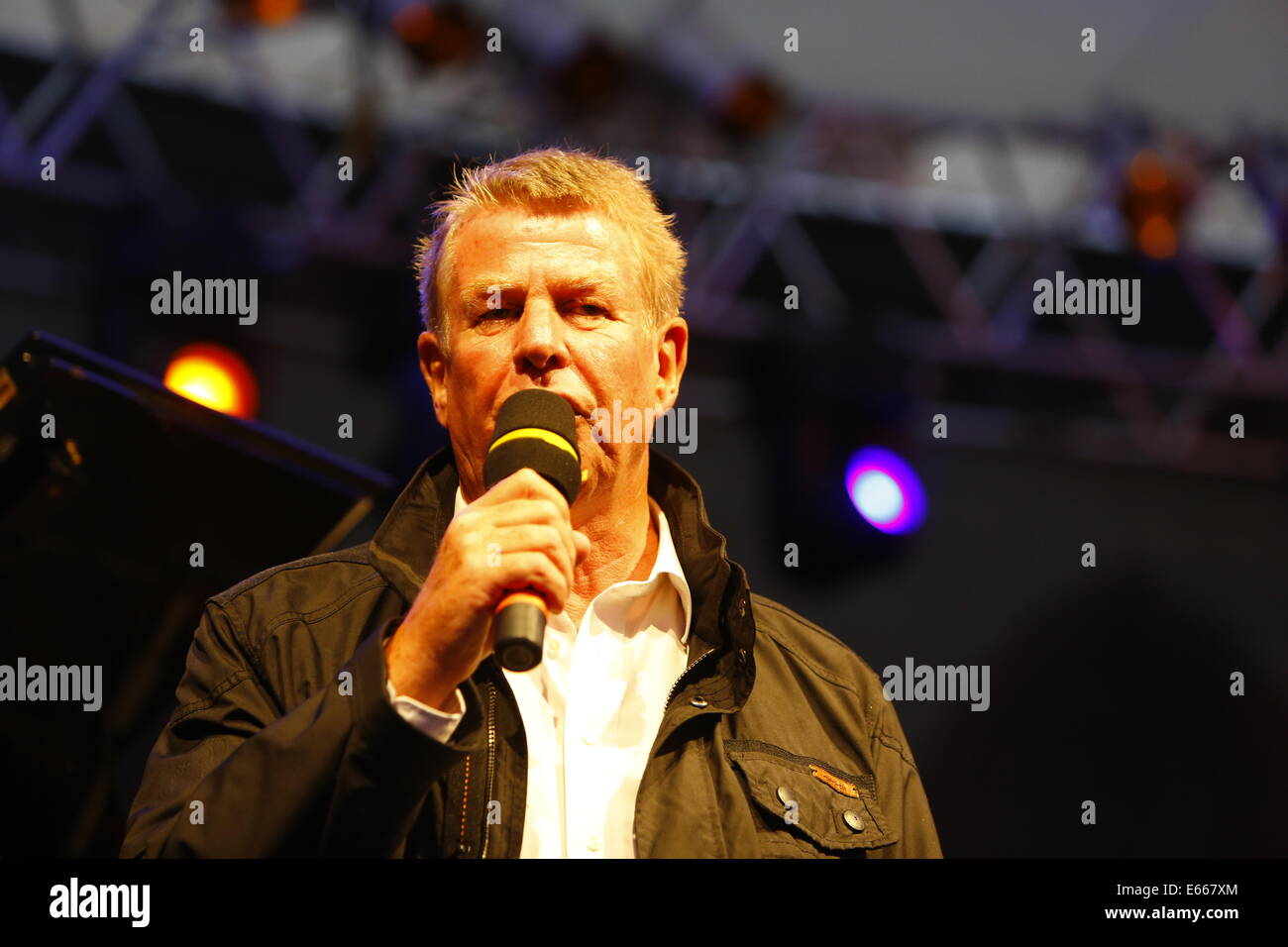 Worms, Germany. 15th Aug, 2014. The Lord Mayor of Worms, Michael Kissel, addresses the audience. The 2014 Jazz and Joy Festival in Worms opened with a performance of regional Jazz musicians who have been selected especially for this performance by the artistic director of the festival. © Michael Debets/Pacific Press/Alamy Live News Stock Photo