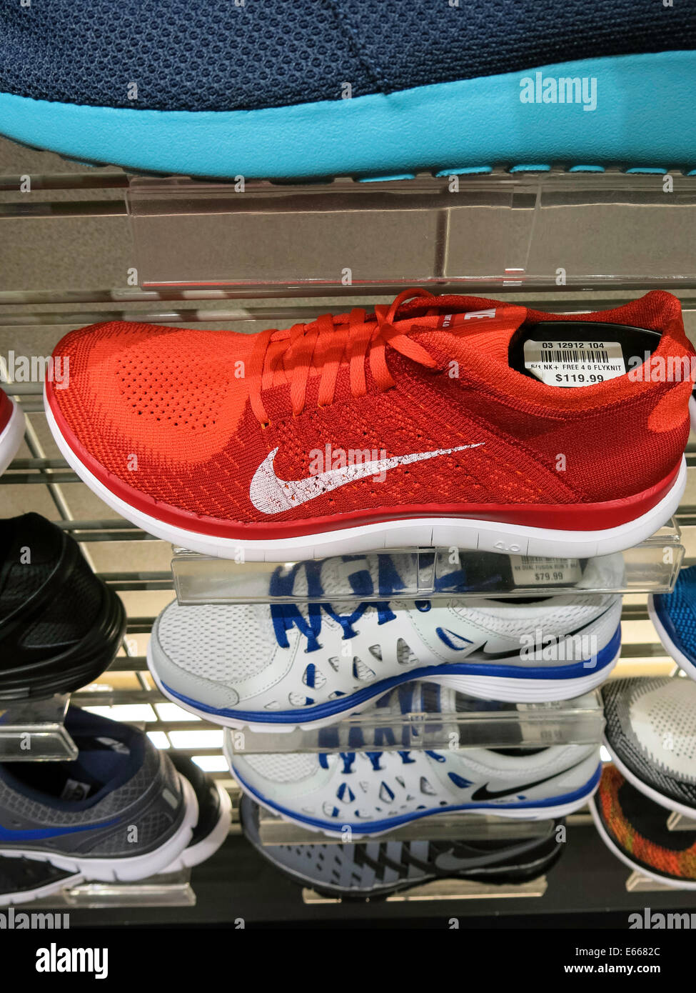 Nike Athletic Shoes with Swoosh Logo,, Champs Sports in the Holiday Village  Mall, Great Falls, MT, USA Stock Photo - Alamy