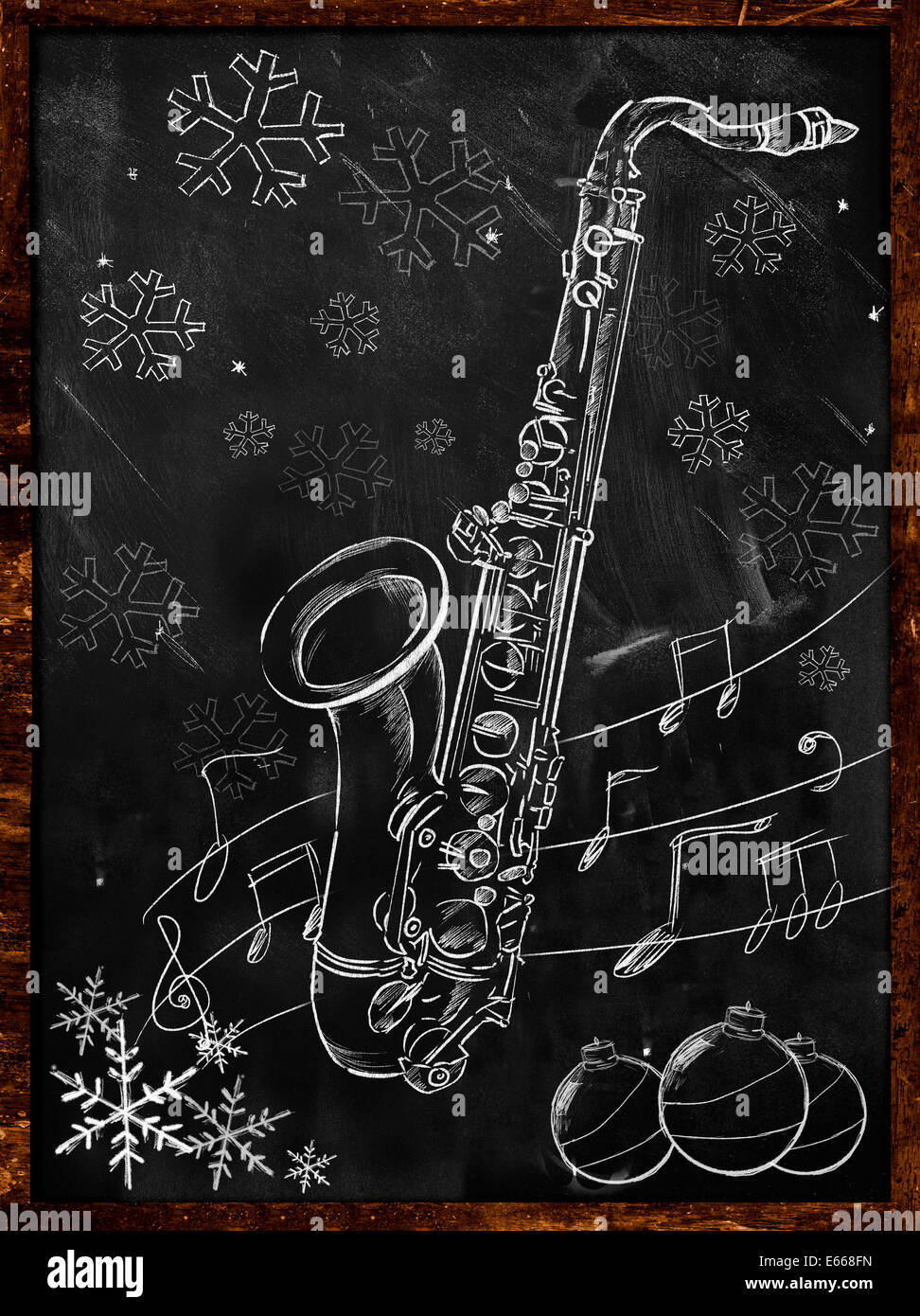 Saxophone Christmas sketch on blackboard Stock Photo