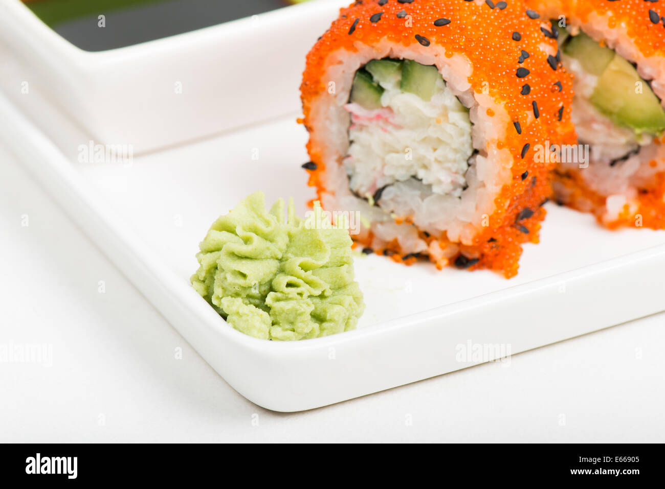 Macro shot of wasabi with rolls on background Stock Photo
