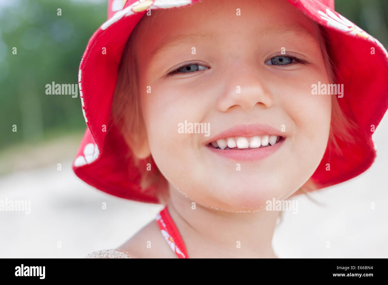 cheerful child girl smiling face close up outdoor Stock Photo