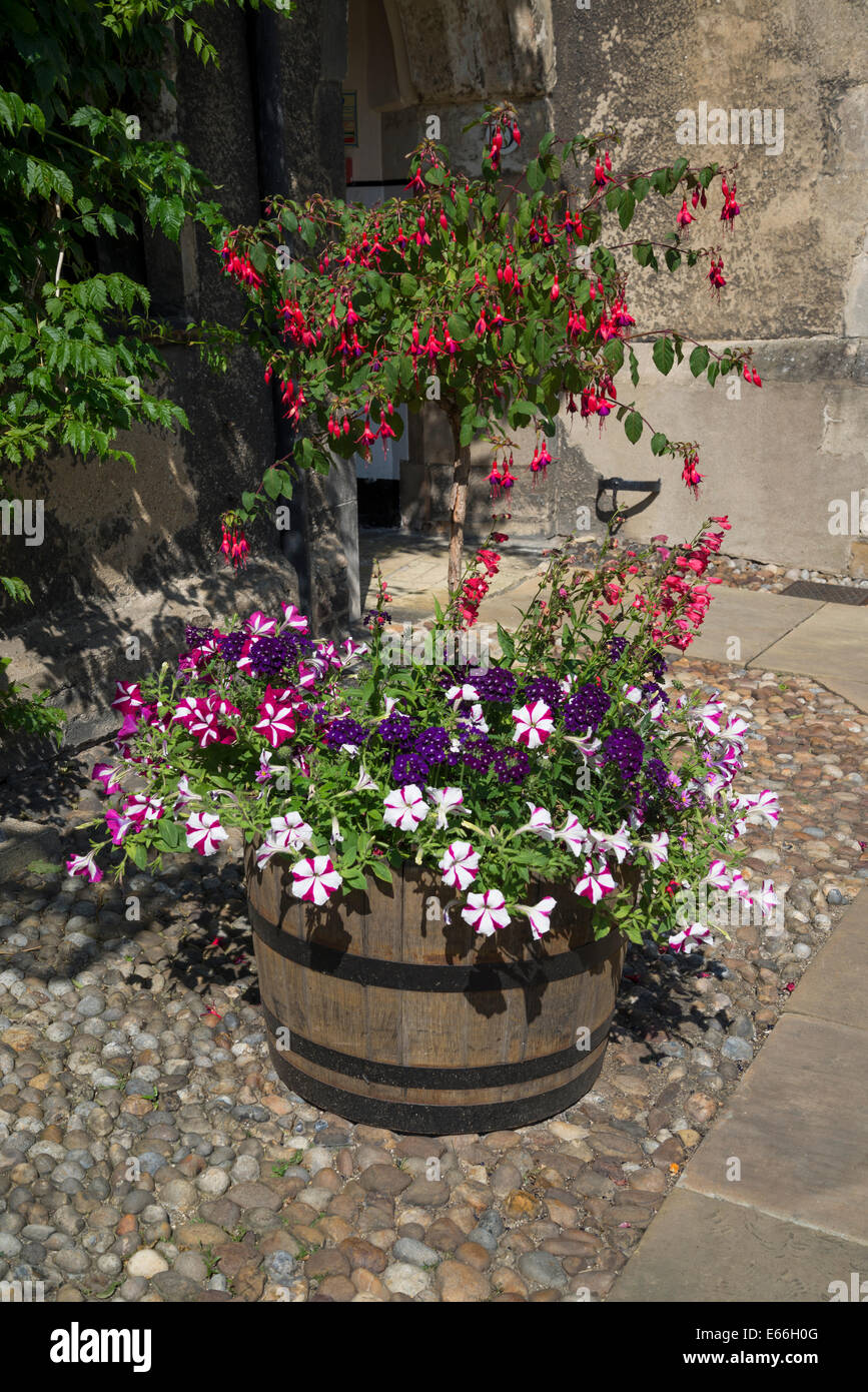 Corpus Christi College, Old Court, flower container with summer flowers, Cambridge, England, UK