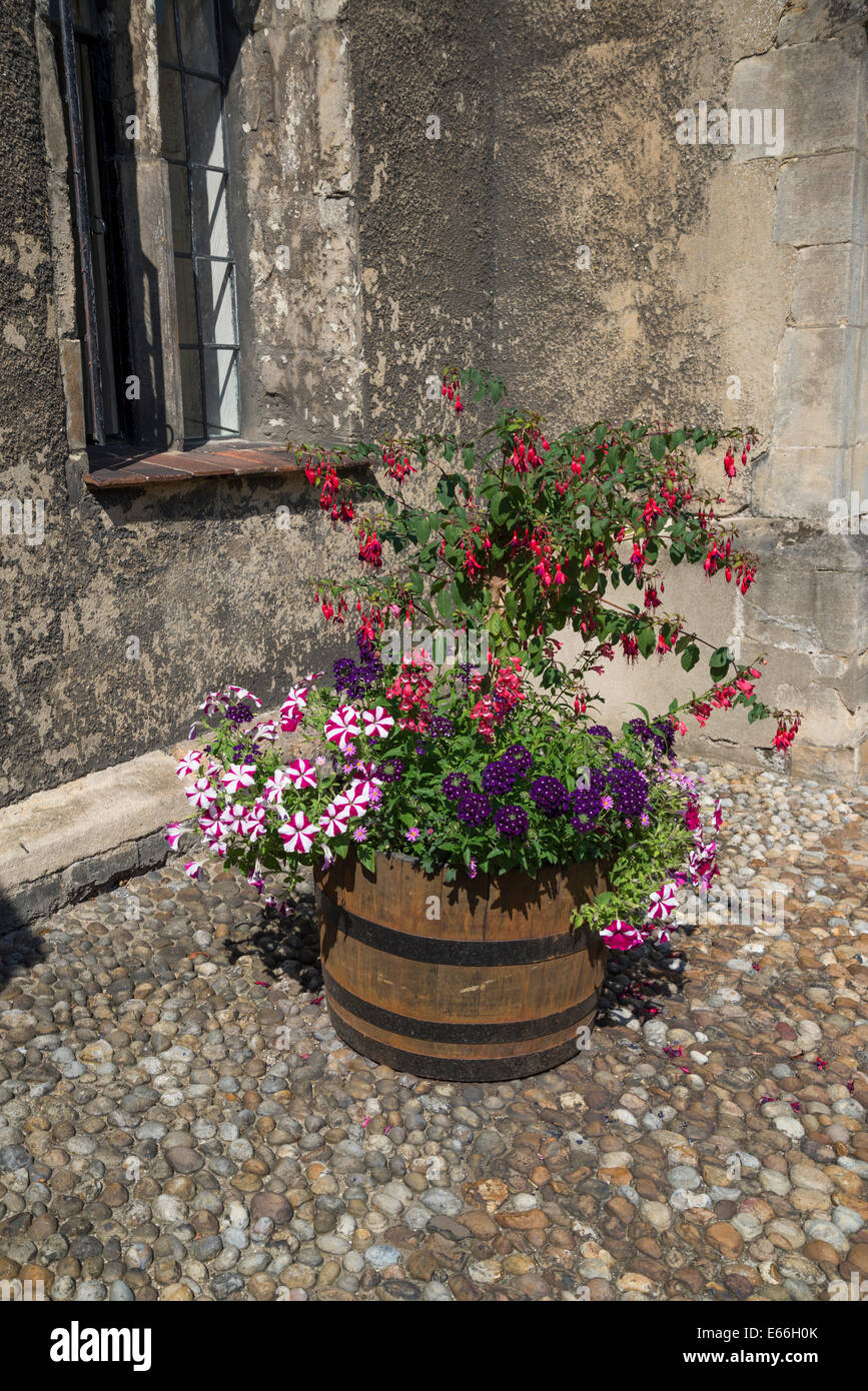 Corpus Christi College, Old Court, flower container with summer flowers, Cambridge, England, UK