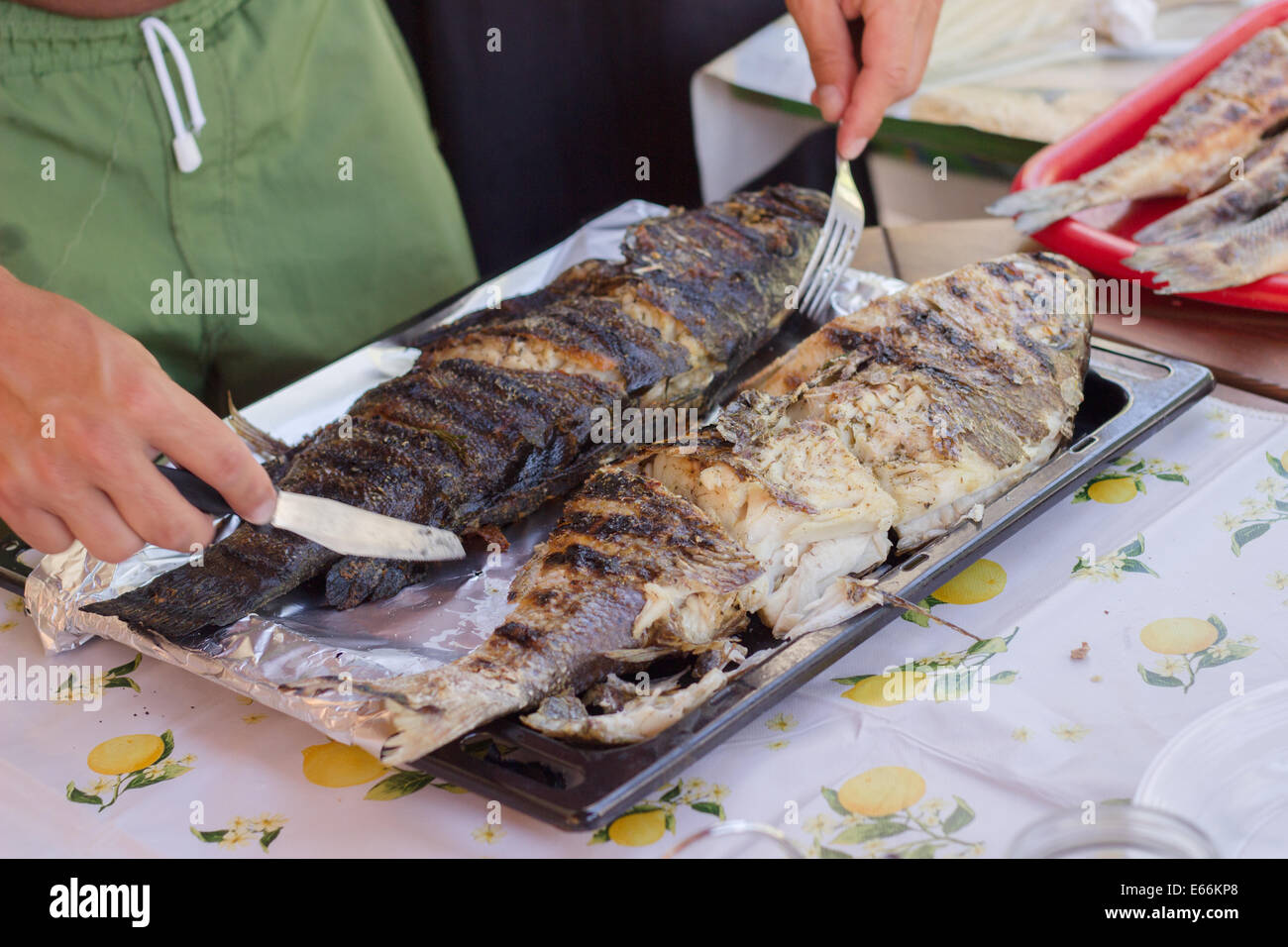 Man preparing seafood hi-res stock photography and images - Alamy