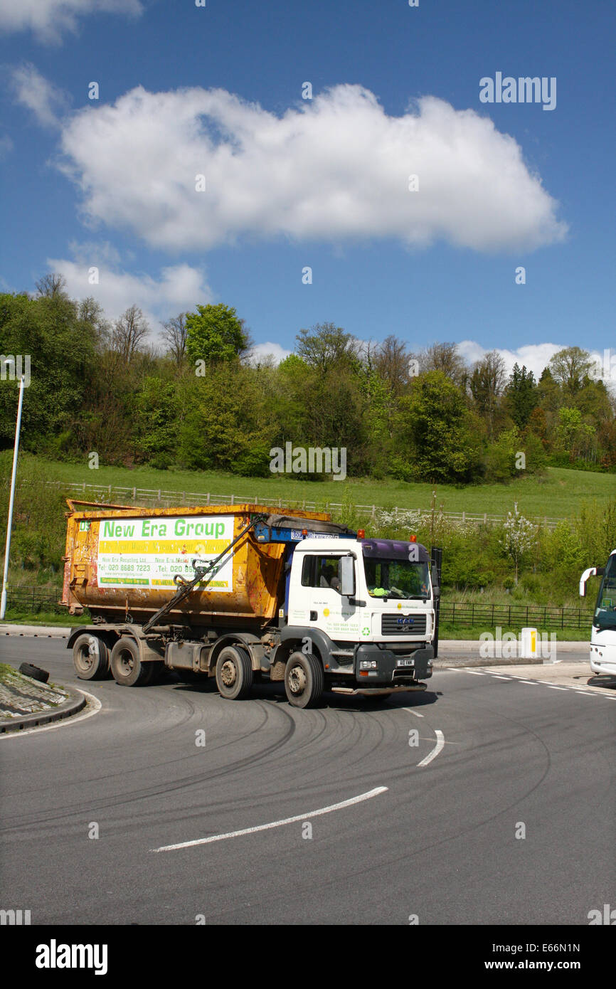 A truck traveling around a roundabout in Coulsdon, Surrey, England