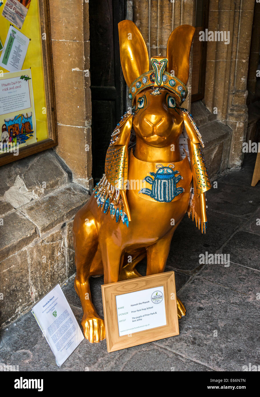 Gold painted Hareoh the pharaoh (later auctioned for £750), from the Cirencester March Hare Festival sculpture trail, Cotswolds, England, UK. Stock Photo