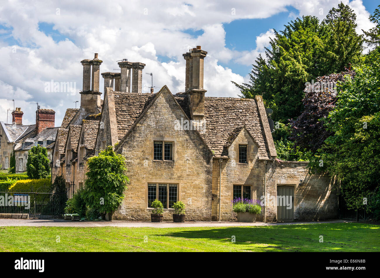 Period houses, Cecilly Hill, at the entrance to Cirencester Park, Cotswolds, Gloucestershire, England, UK. Stock Photo