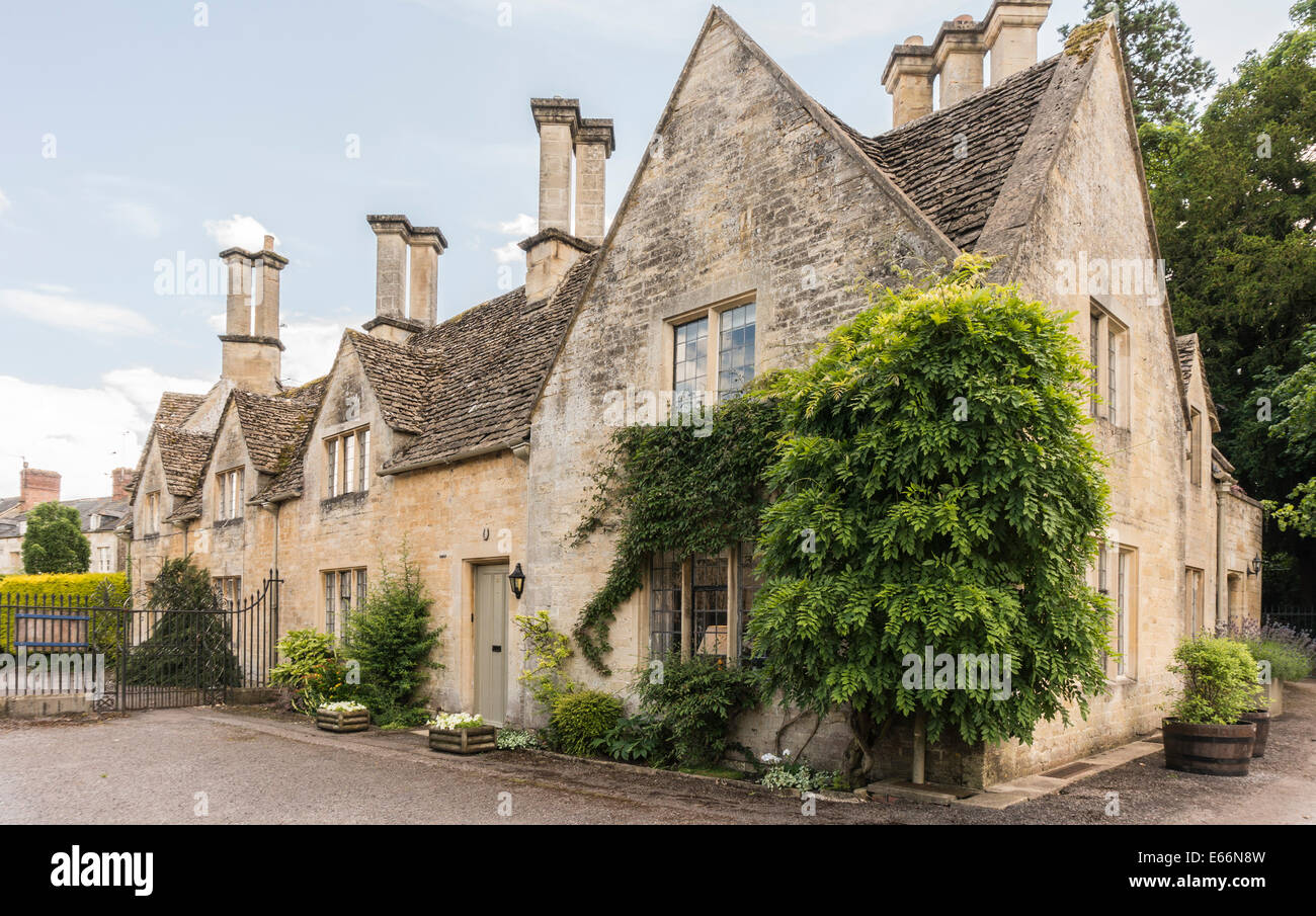 Beautiful stone built period houses, on historic Cecily Hill, right next to Cirencester Park entrance, Cotswolds, Gloucestershire, England, UK. Stock Photo