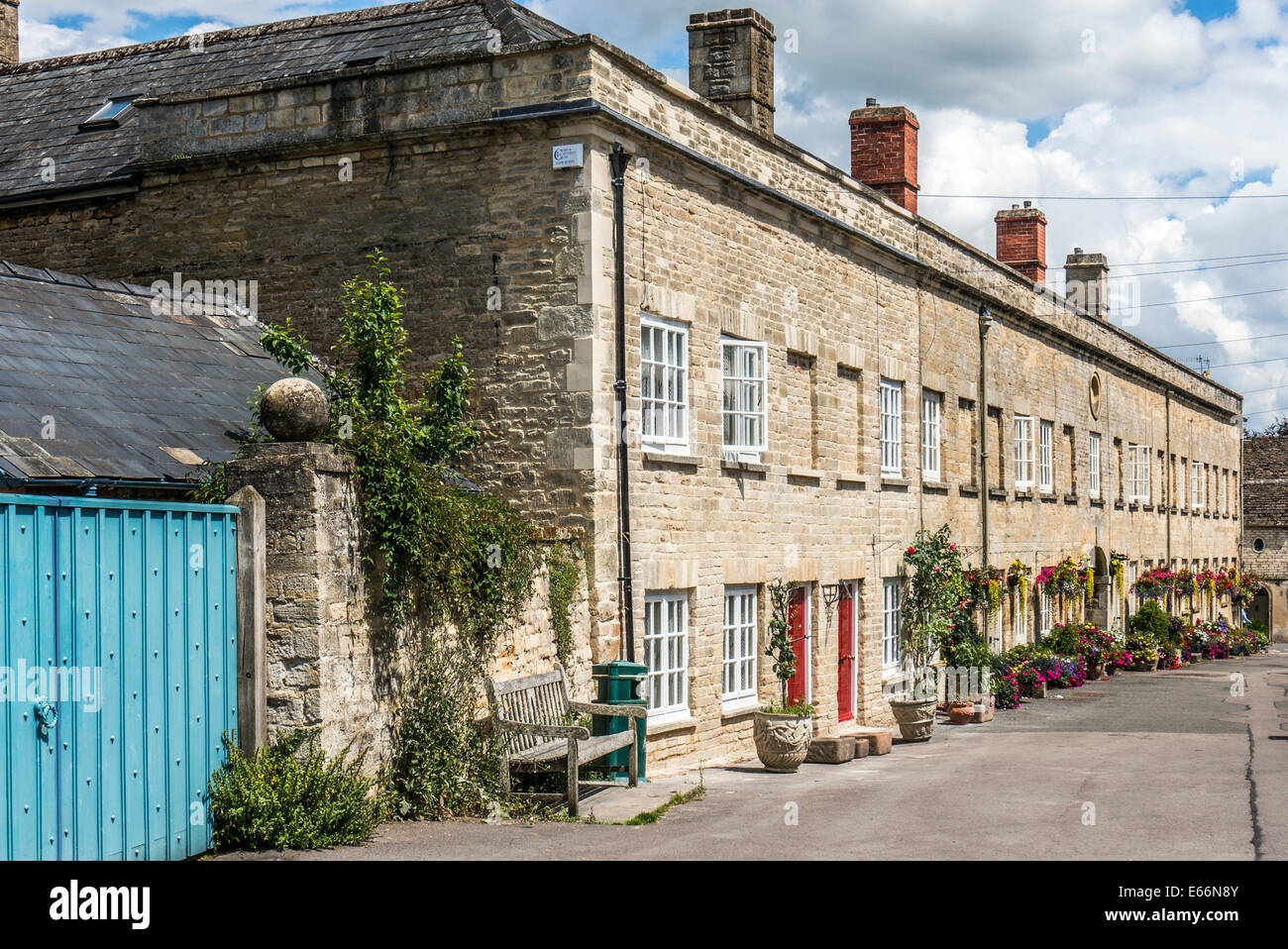 A picturesque row of period houses in the parade of Tontine Buildings, Cecily Hill, Cirencester, Cotswolds, Gloucestershire, England, UK. Stock Photo