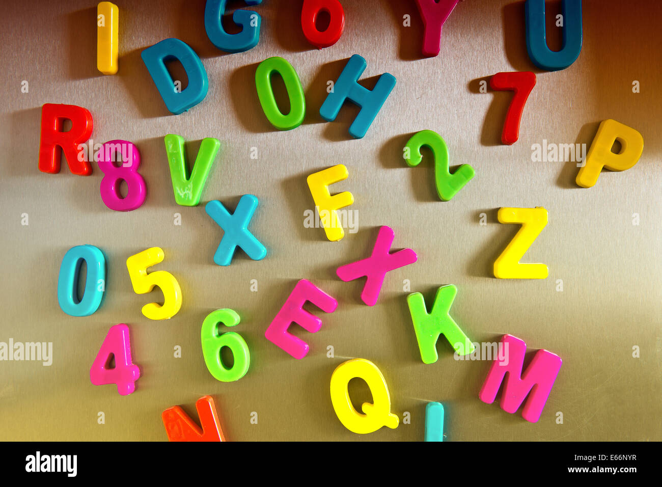 Colorful magnetic letters on refrigerator Stock Photo