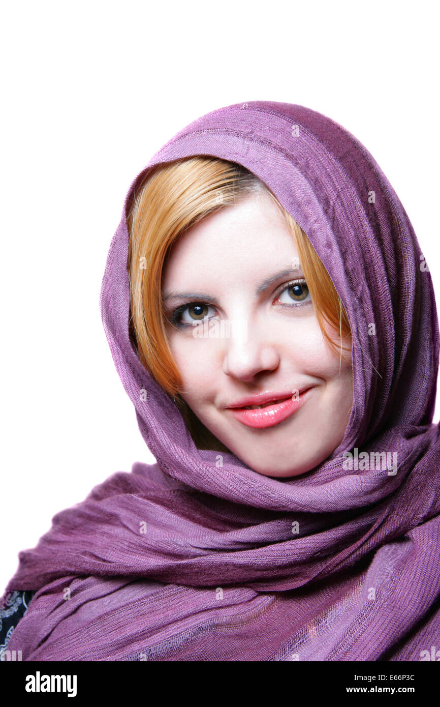 Portrait of pretty young woman with headscarf isolated over white background Stock Photo
