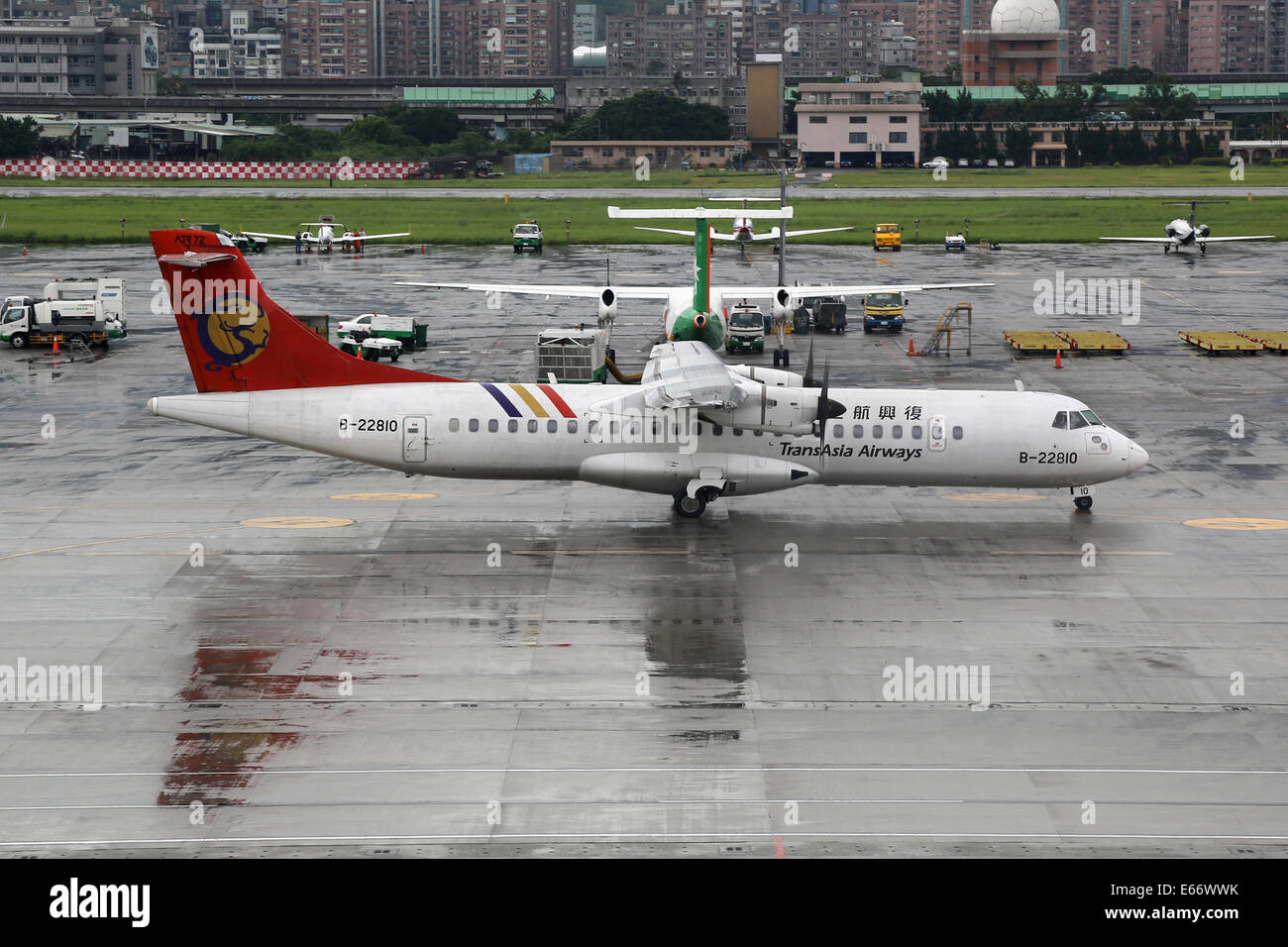 Taipei, Taiwan - May 18, 2014: A TransAsia Airways ATR 72-200 with the registration B-22810 taxis at Taipei Songshan Airport (TS Stock Photo