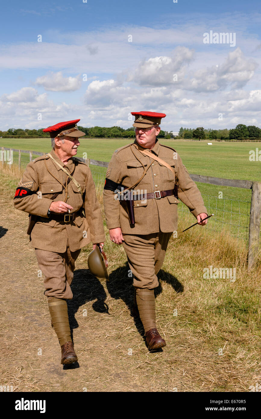 Kent, UK. 16th Aug, 2014. Two men in British WW1 MP uniforms at The 6th  Annual Combined Ops Show at Headcorn Airfield. Featuring fly-overs, war  re-enactments, fancy dress, actual and replica memorabilia,