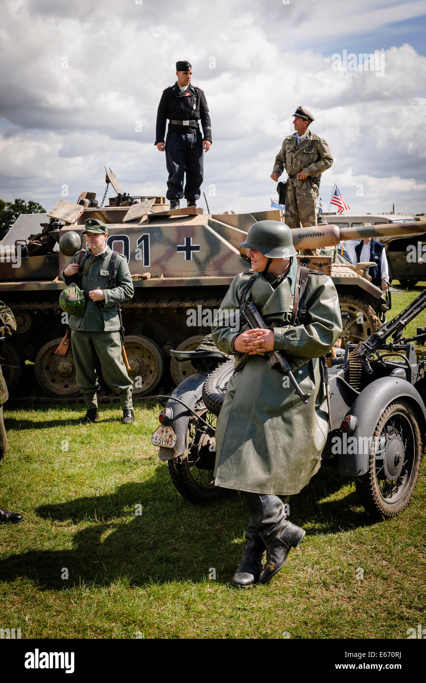 Kent, UK. 16th Aug, 2014. The 6th Annual Combined Ops Show at Headcorn Airfield. Featuring fly-overs, war re-enactments, fancy dress, actual and replica memorabilia, and more. Credit:  Tom Arne Hanslien/Alamy Live News Stock Photo