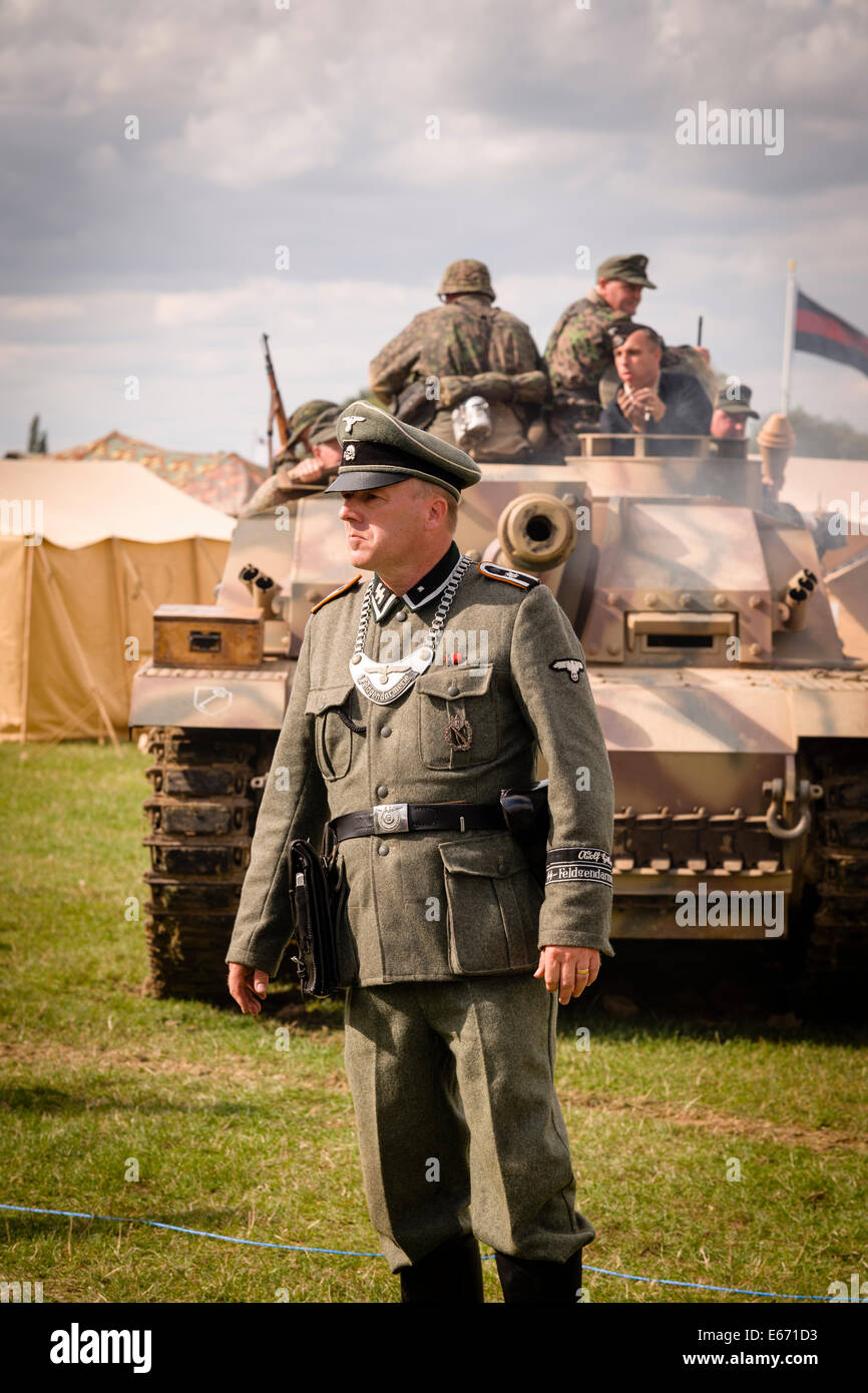 Kent, UK. 16th Aug, 2014. The 6th Annual Combined Ops Show at Headcorn Airfield. Featuring fly-overs, war re-enactments, fancy dress, actual and replica memorabilia, and more. Credit:  Tom Arne Hanslien/Alamy Live News Stock Photo