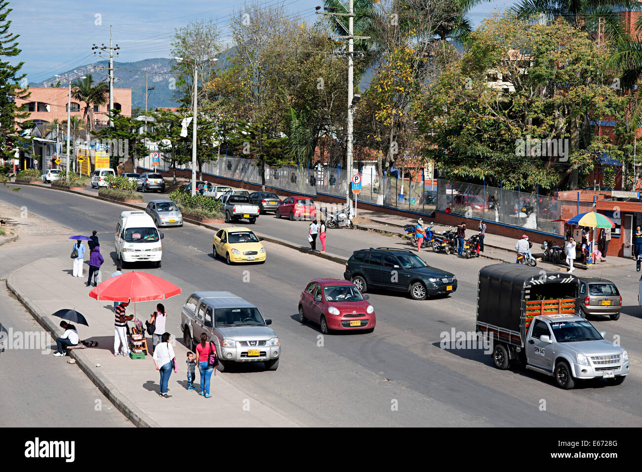 A busy road outside the hospital San Rafael in Fusagasuga, Colombia, South America. Stock Photo