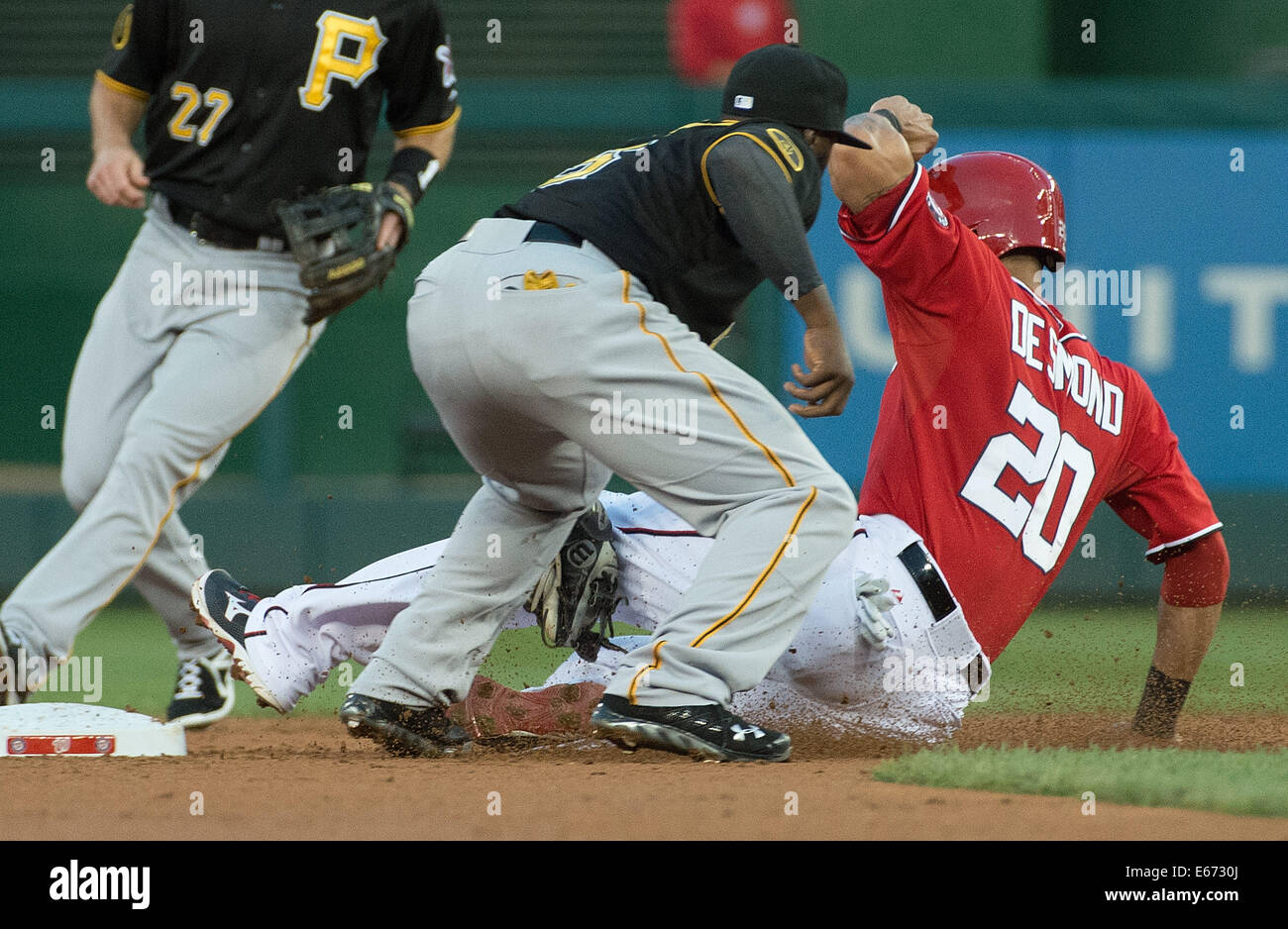 Washington, DC, USA. 16th Aug, 2014. Washington Nationals shortstop Ian Desmond (20) is tagged out attempting to steal second base by Pittsburgh Pirates shortstop Josh Harrison (5) during the first inning of their game at Nationals Park in Washington, D.C, Saturday, August 16, 2014. Credit:  Harry E. Walker/ZUMA Wire/Alamy Live News Stock Photo