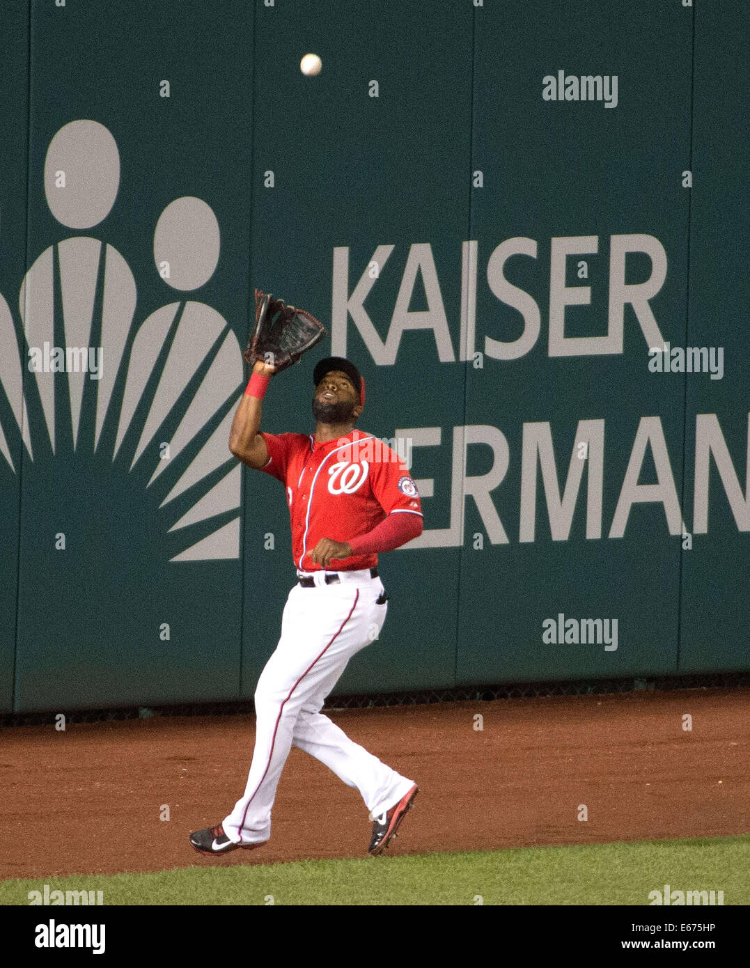 Washington, DC, USA. 16th Aug, 2014. Washington Nationals center fielder Denard Span (2) catches a fly ball on the warning track during the fifth inning of their game against the Pittsburgh Pirates at Nationals Park in Washington, D.C, Saturday, August 16, 2014. Credit:  Harry E. Walker/ZUMA Wire/Alamy Live News Stock Photo