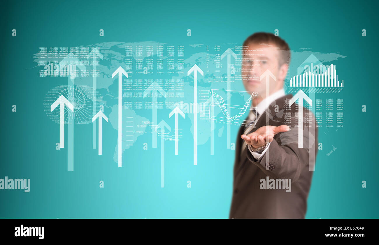 Businessman with graphs and arrows Stock Photo - Alamy