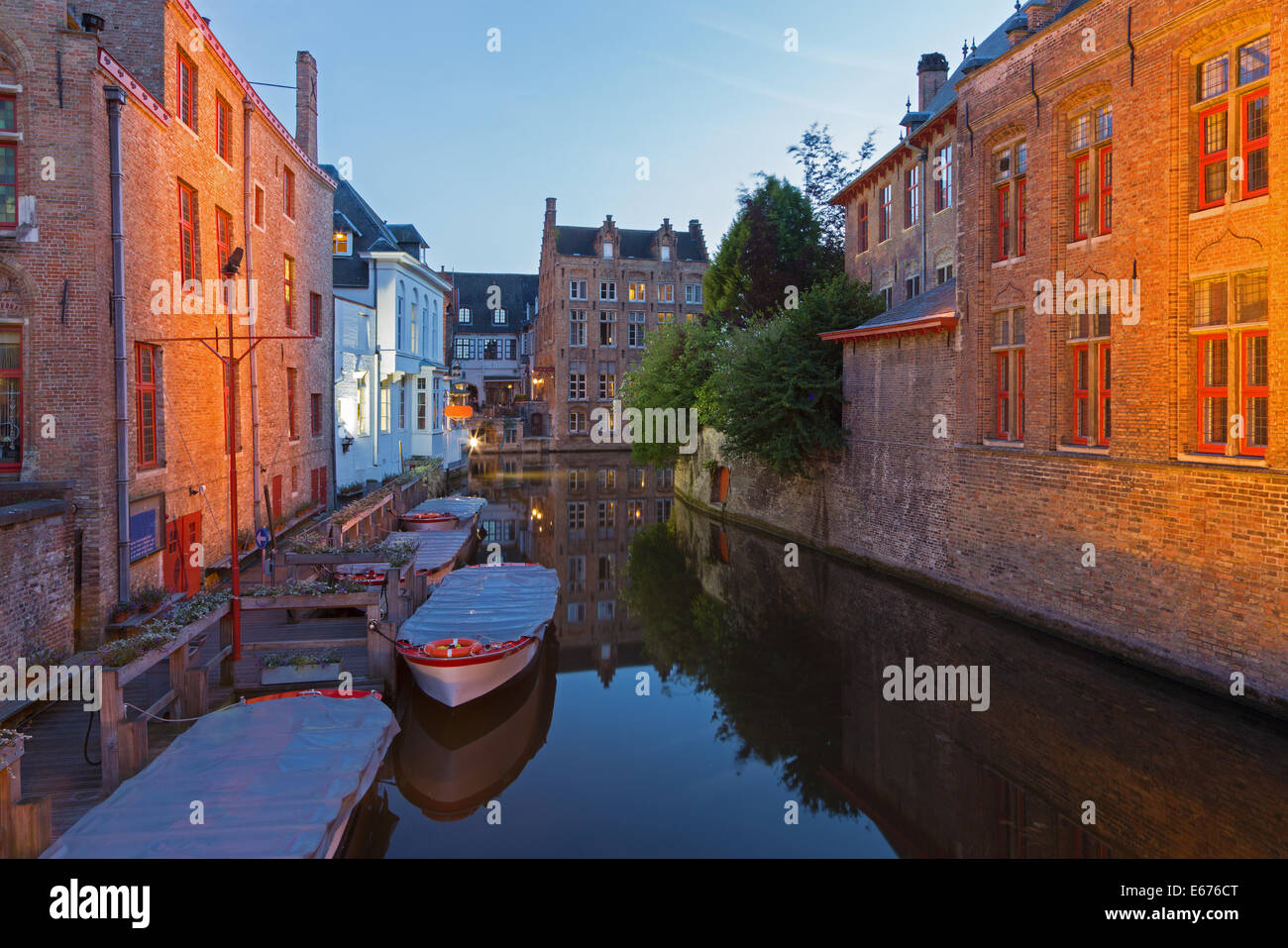 Bruges - Look to canal form bridge on the Blinge Ezelstraat at dusk Stock Photo