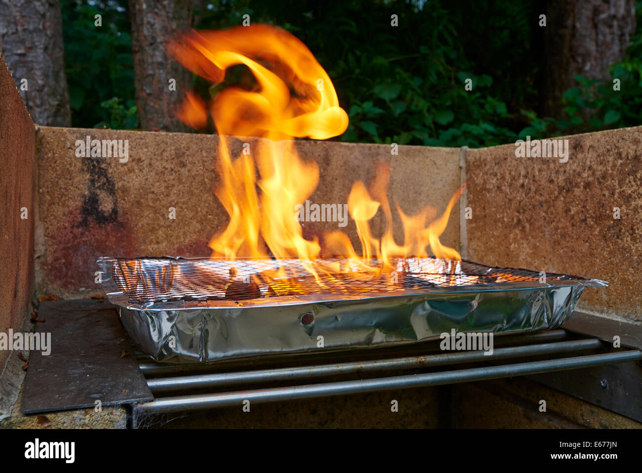 Recently Lit Disposable Barbecue Stock Photo Alamy