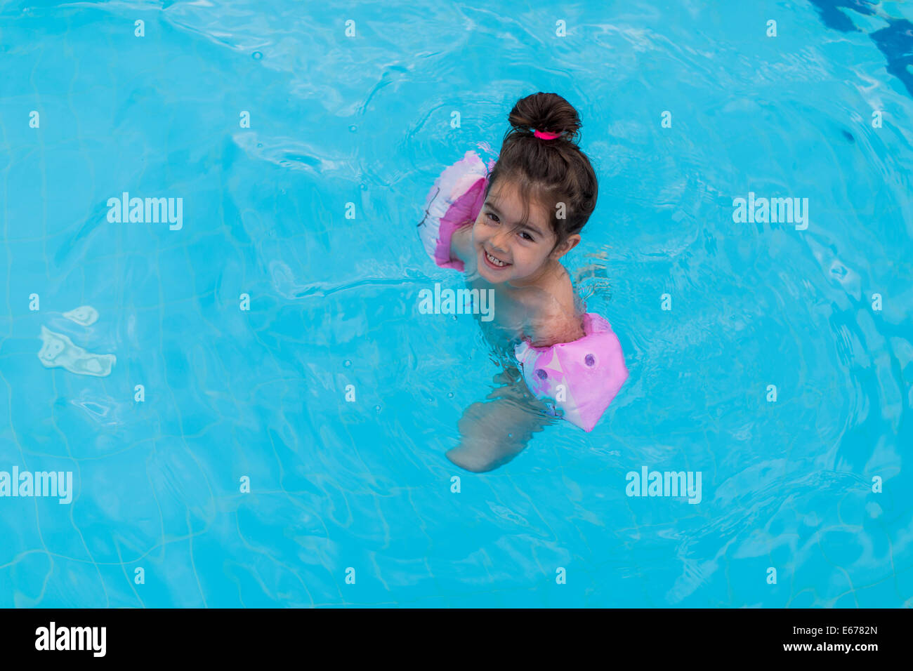 Little girl swimming in the pool Stock Photo Alamy