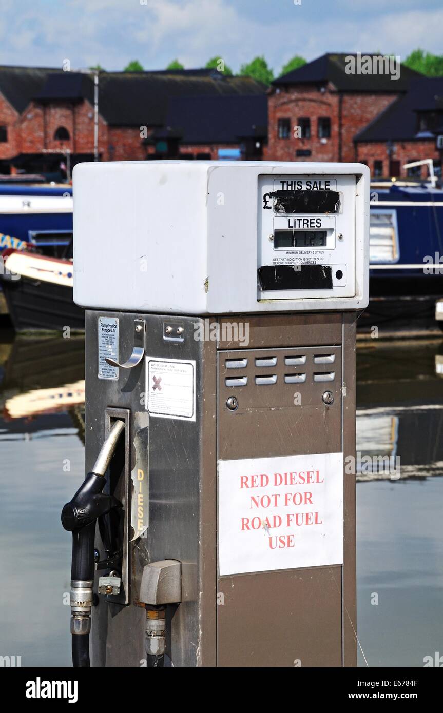 Red Diesel dispenser with narrowboats to the rear in the canal basin