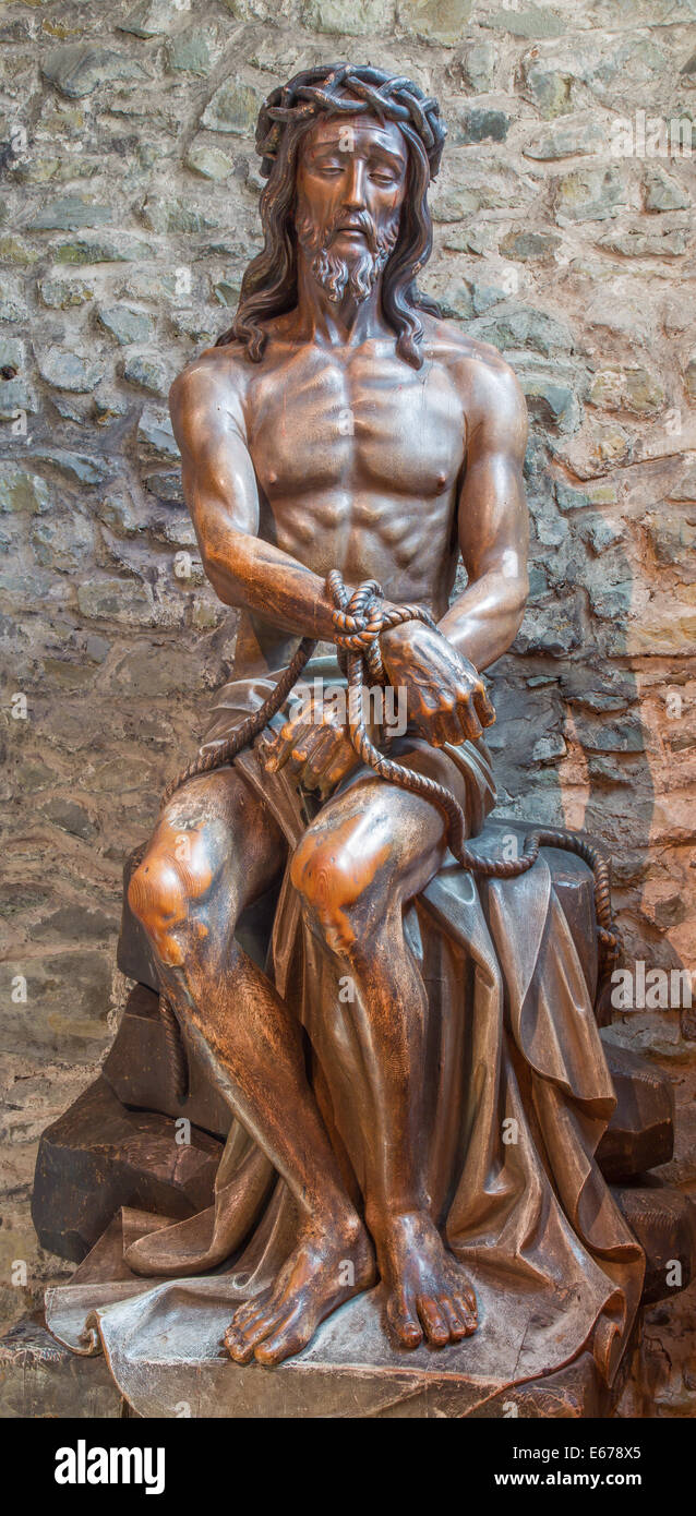 BRUGGE, BELGIUM - JUNE 13: Statue of Jesus in the bond in Basilica of the Holy bold. Stock Photo
