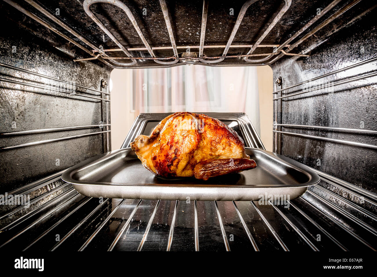 Roast chicken in the oven. Cooking in the oven Stock Photo Alamy