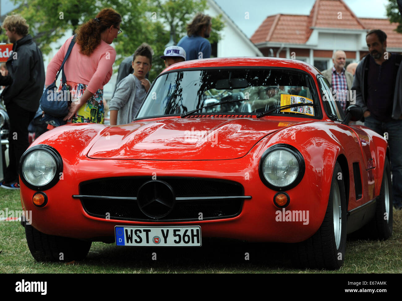 Rastede, Germany. 17th Aug, 2014. A specially prepared Mercedes Benz 300 SL sports car from 1957 stands at the 8th vintage car meeting for cars and motorcycles in Rastede, Germany, 17 August 2014. Photo: Ingo Wagner/dpa/Alamy Live News Stock Photo