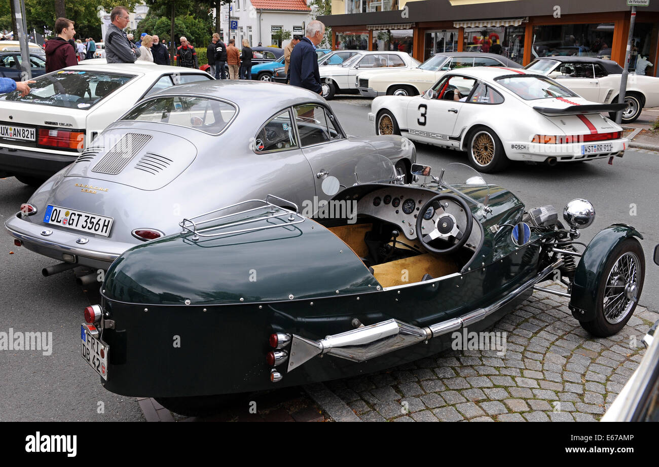 Rastede, Germany. 17th Aug, 2014. A three-wheeled Riley sports car from Great Britain with Moto Guzzi engine stands at the 8th vintage car meeting for cars and motorcycles in Rastede, Germany, 17 August 2014. Photo: Ingo Wagner/dpa/Alamy Live News Stock Photo