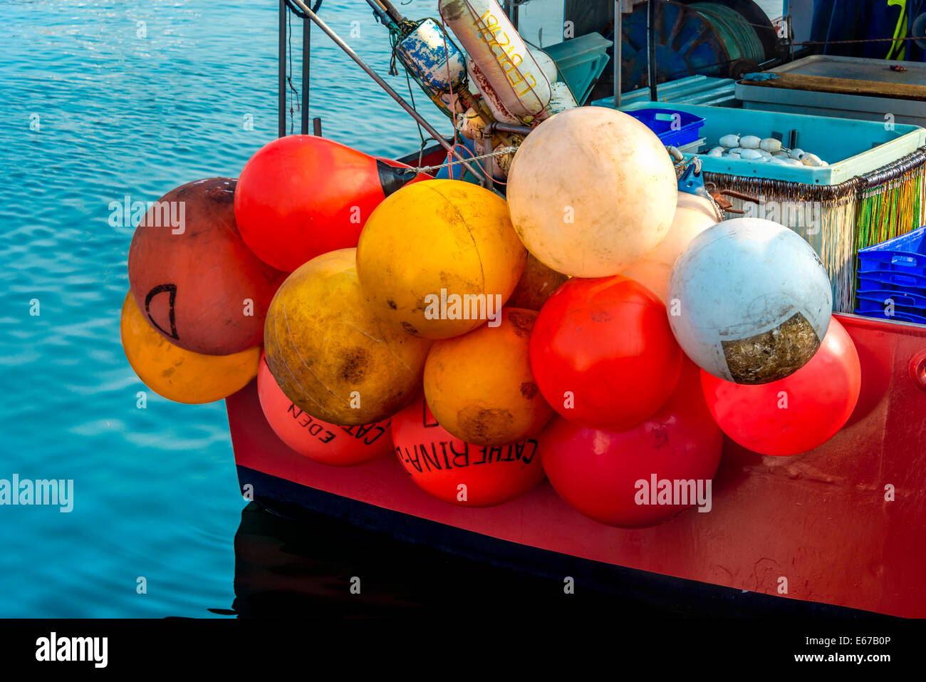 https://c8.alamy.com/comp/E67B0P/colourful-floats-on-fishing-boat-eden-harbour-eden-south-coast-of-E67B0P.jpg