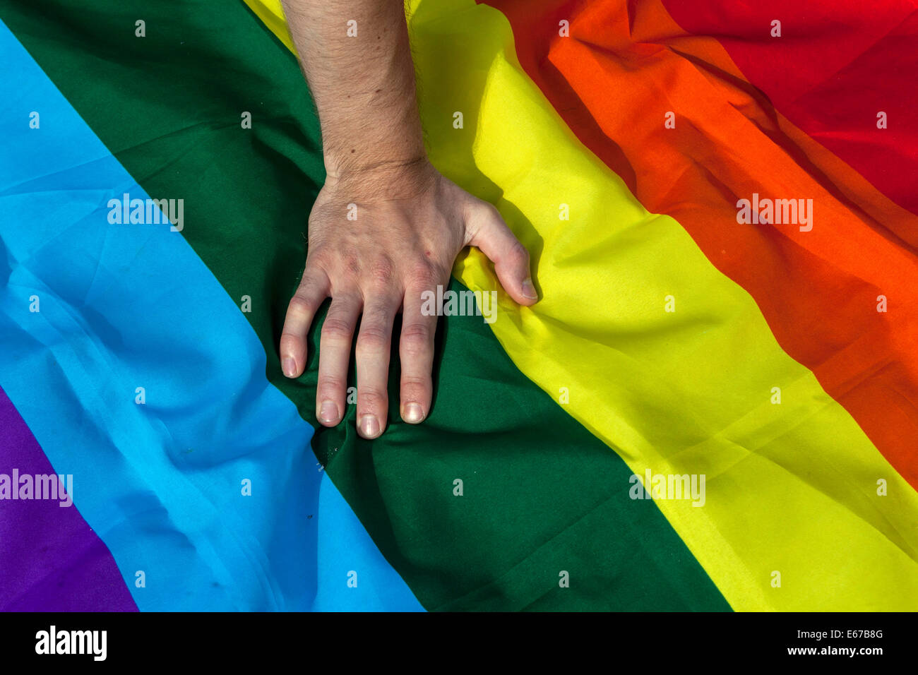 LGBT flag and hand Stock Photo