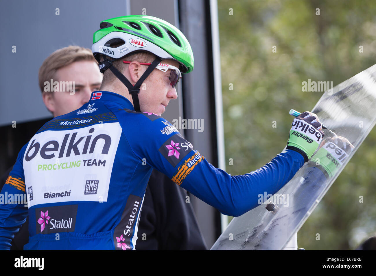 Tromsoe, Norway. 17th Aug, 2014. Arctic Race of Norway 2014, day 3 Steven Kruijswijk (Belkin Pro Cycling) with the blue leaders jersey signing in before the last stage of Arctic Race of Norway in Tromsoe, Norway. The stage was 165km with start and finish in Tromsoe. Credit:  Radarfoto/Alamy Live News Stock Photo
