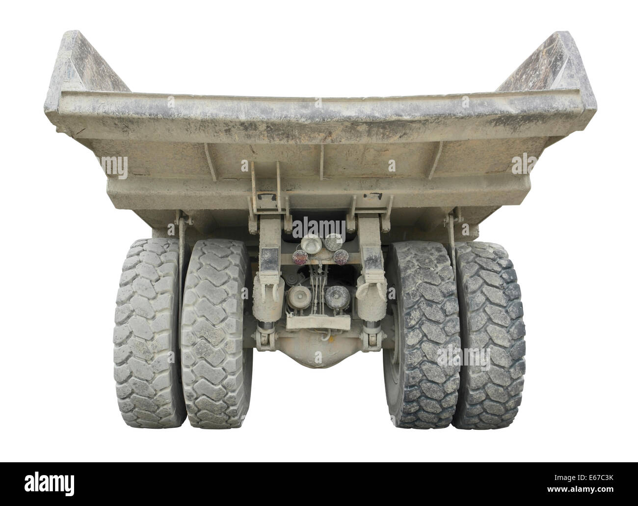 backside of a rundown dump truck in white back Stock Photo